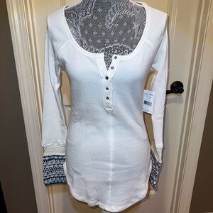 Free People White long sleeve shirt with blue knit sleeves and buttons. NWT